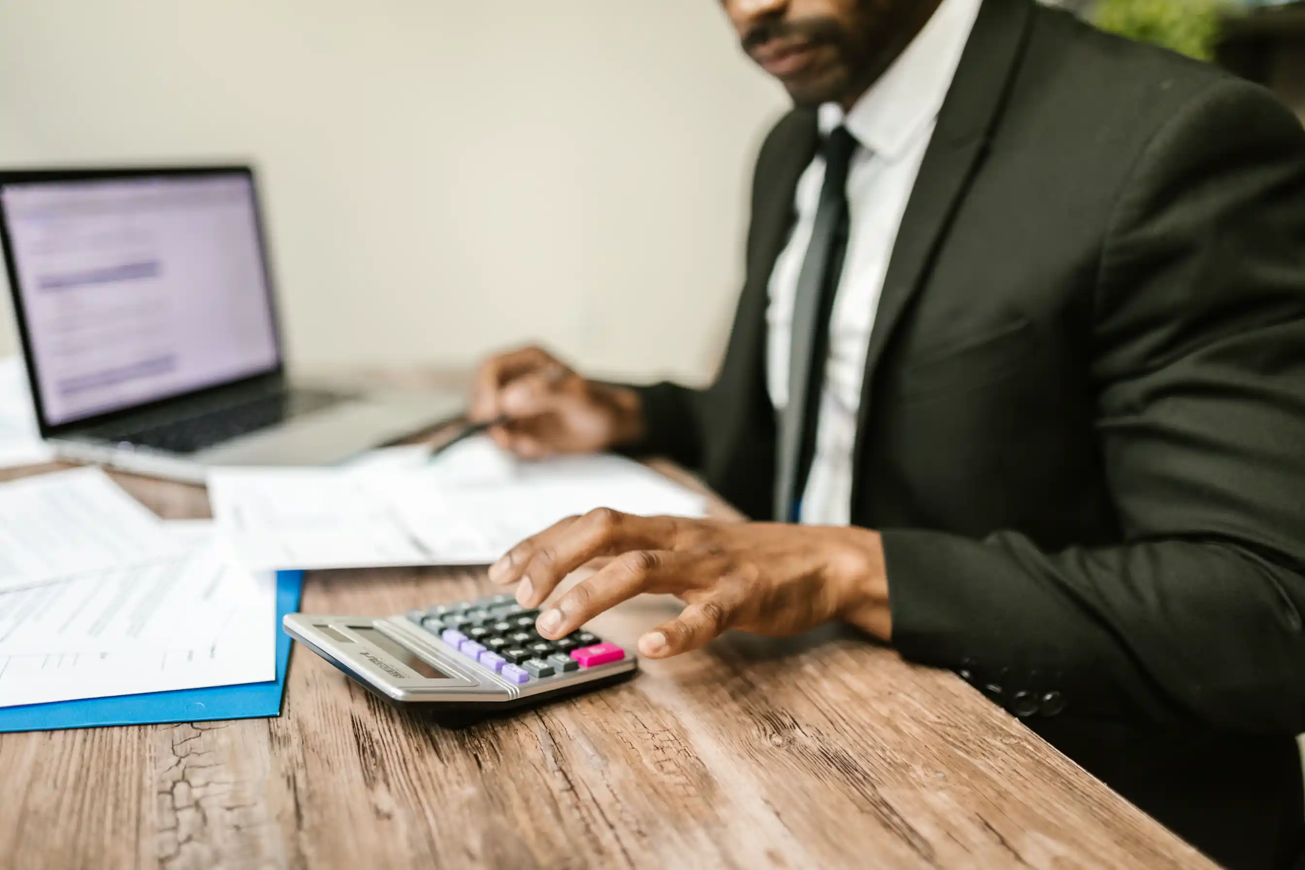 A corporate accountant working through a financial plan