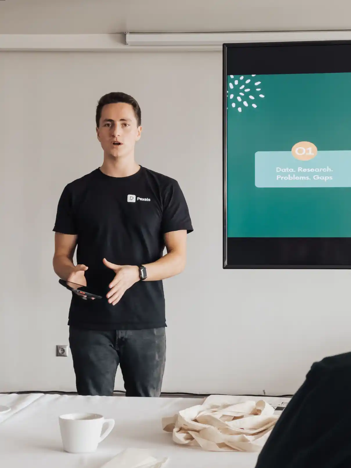 A founder presenting market research findings to a team