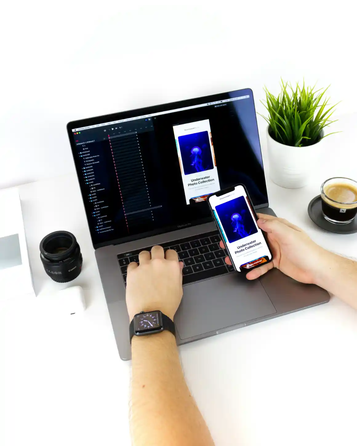 A laptop and a phone side by side on a bright desk