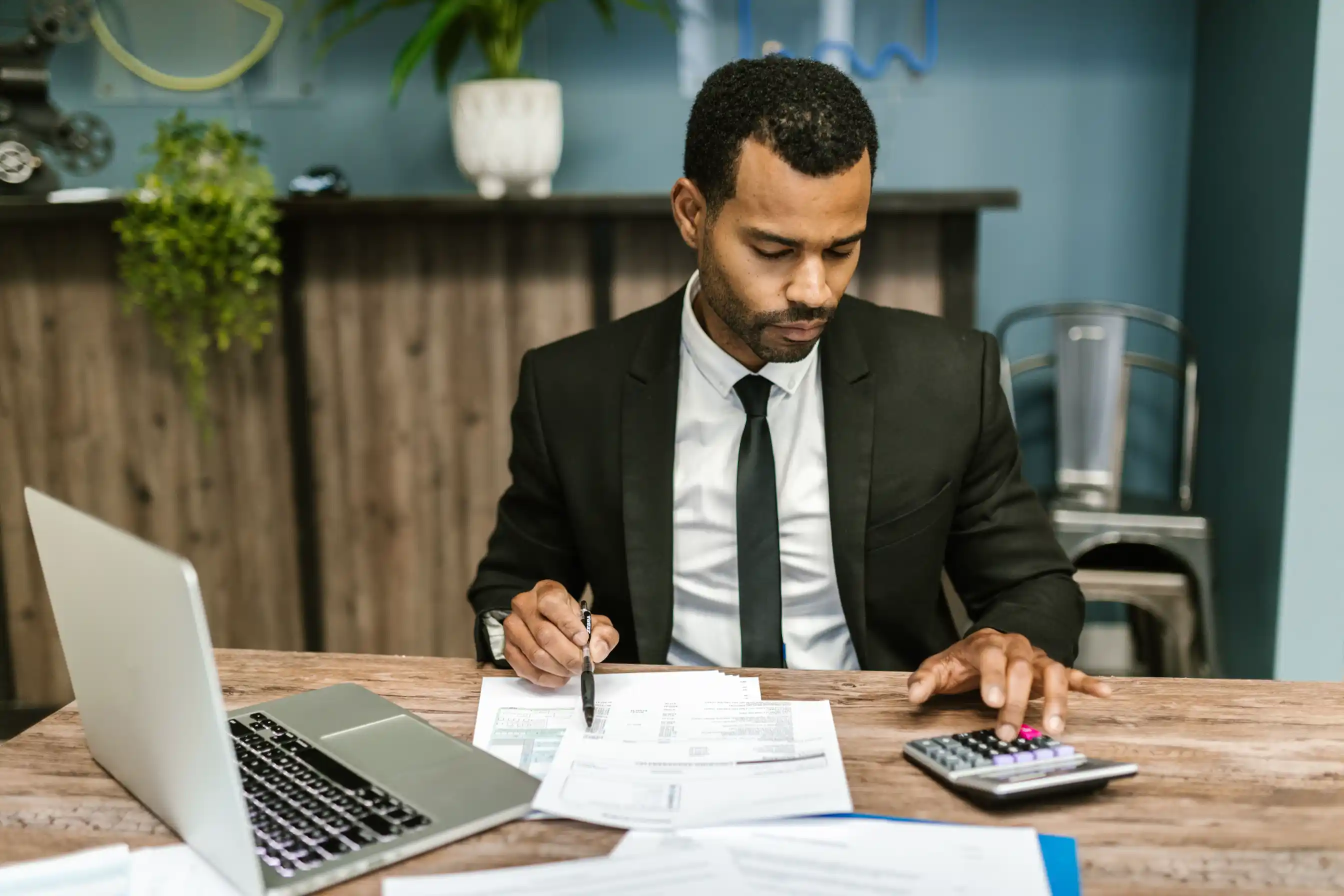 A professional accountant working in a bright office